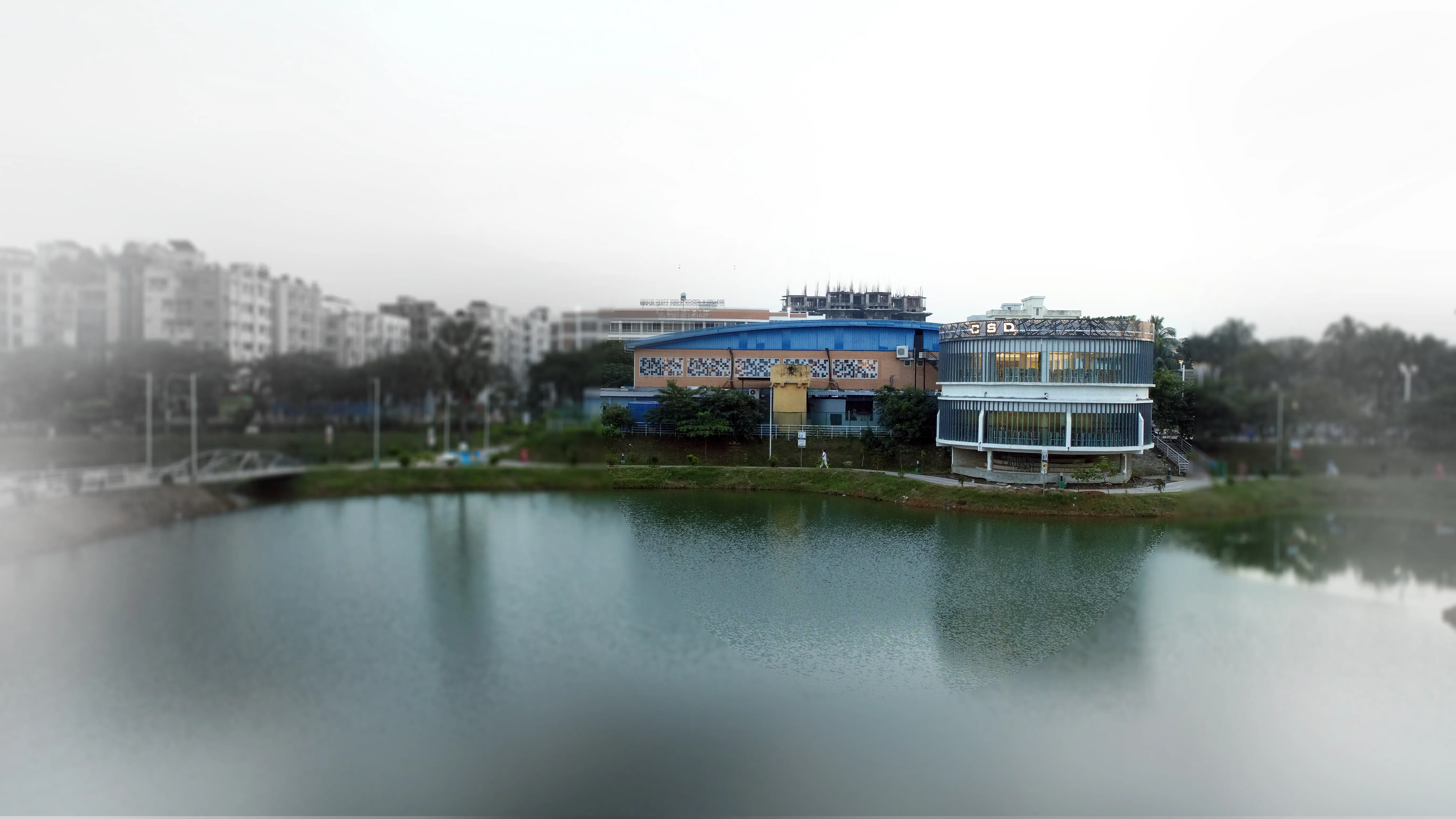 Vertical louver architectural crown reflected on lake